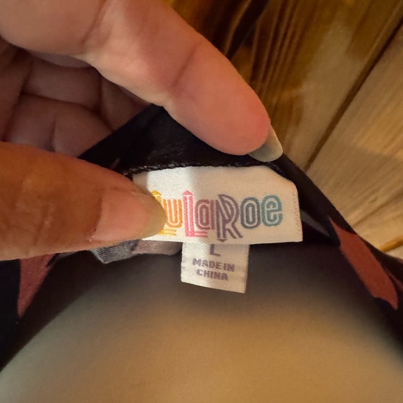 LuLaRoe Iris Black and Pink Short Sleeve T-Shirt - Picture 2 of 2